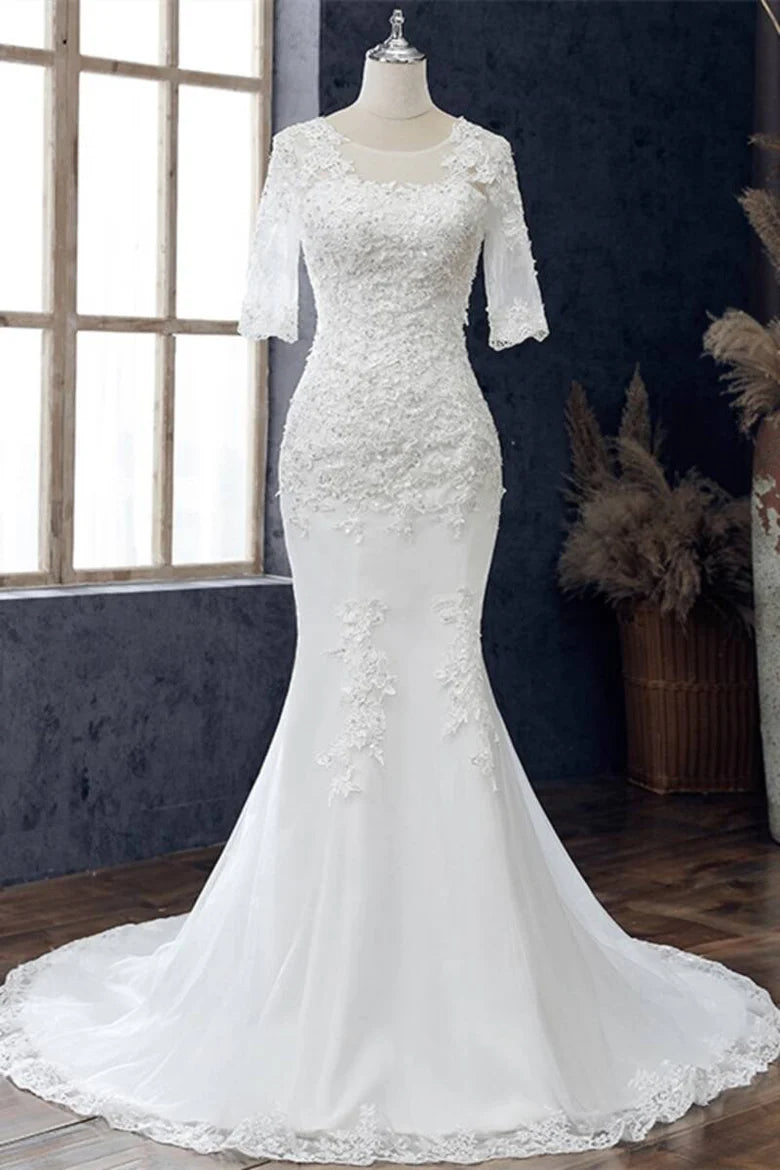 Vestido de novia de sirena con media manga y joya blanca